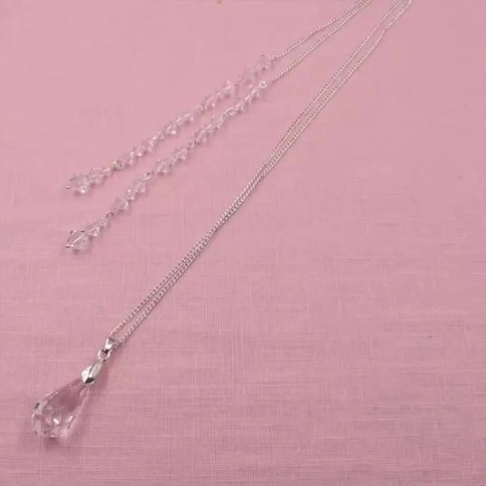 Collier de dos mariage avec perles transparentes Collier de dos mariage avec perles transparentes