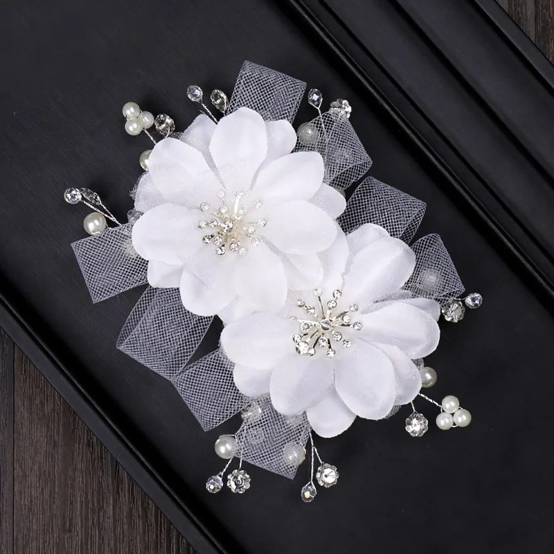 Barrette cheveux mariage à fleurs blanches Barrette cheveux mariage à fleurs blanches