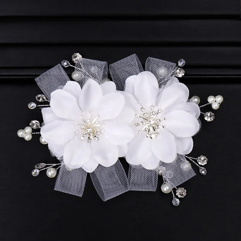 Barrette cheveux mariage à fleurs blanches Barrette cheveux mariage à fleurs blanches