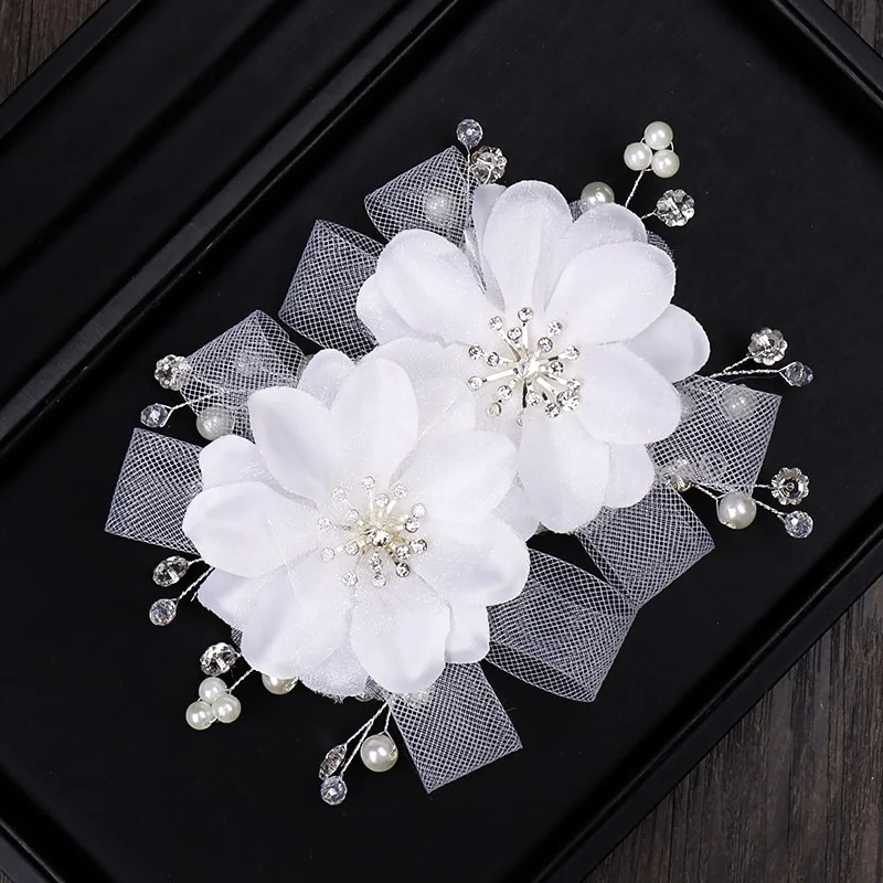 Barrette cheveux mariage à fleurs blanches Barrette cheveux mariage à fleurs blanches